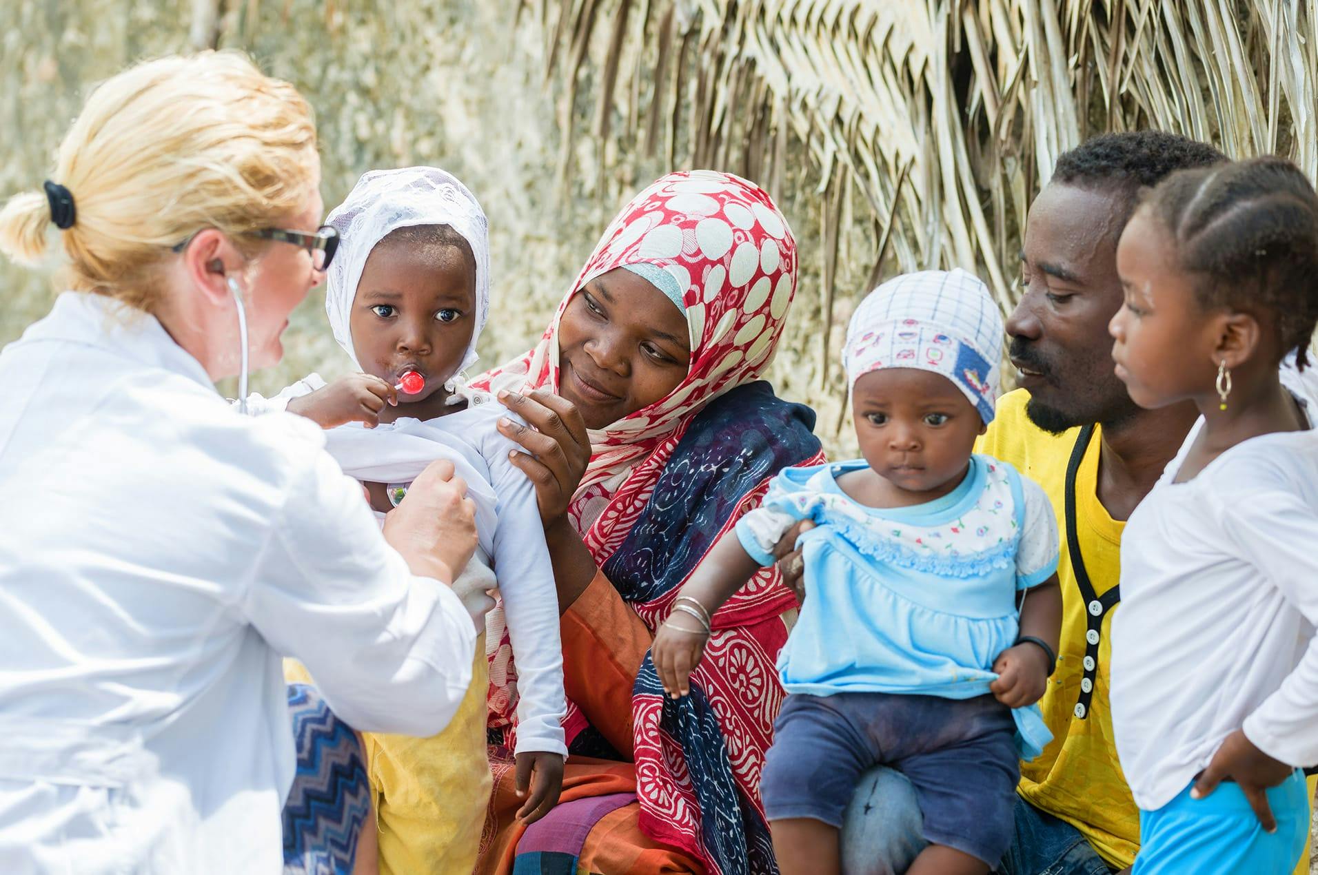 nurse checking on family
