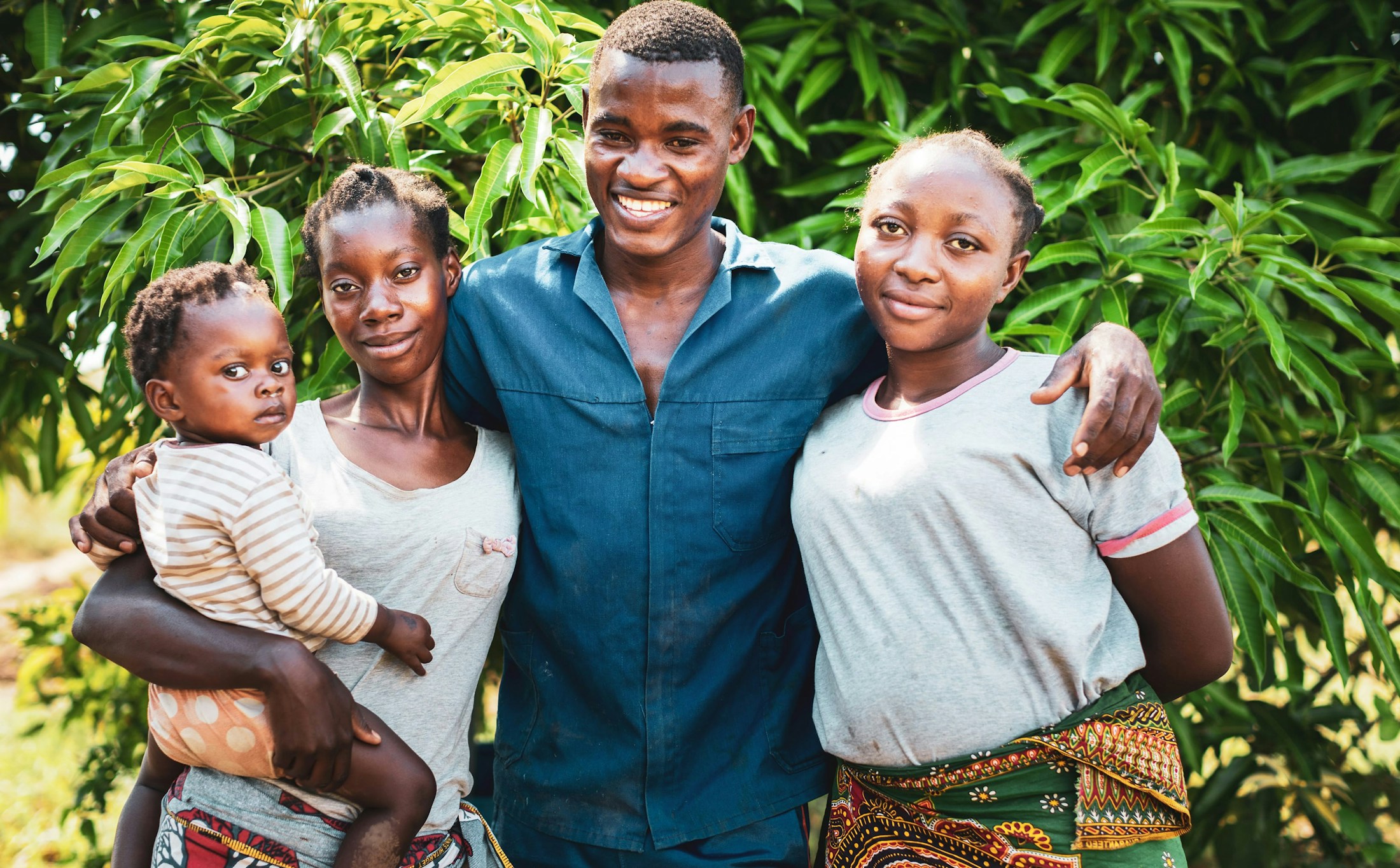 a father, mother, daughter, and son family photo