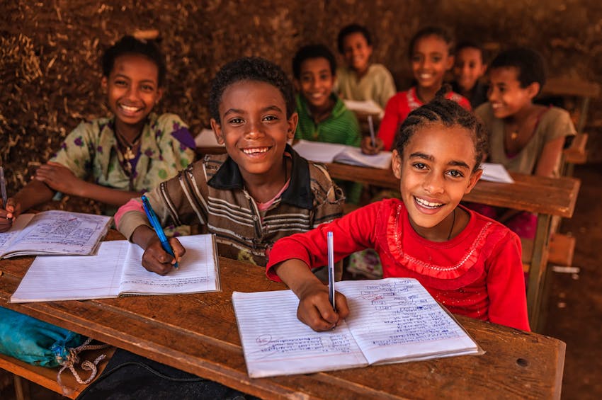 kis smiling while doing work