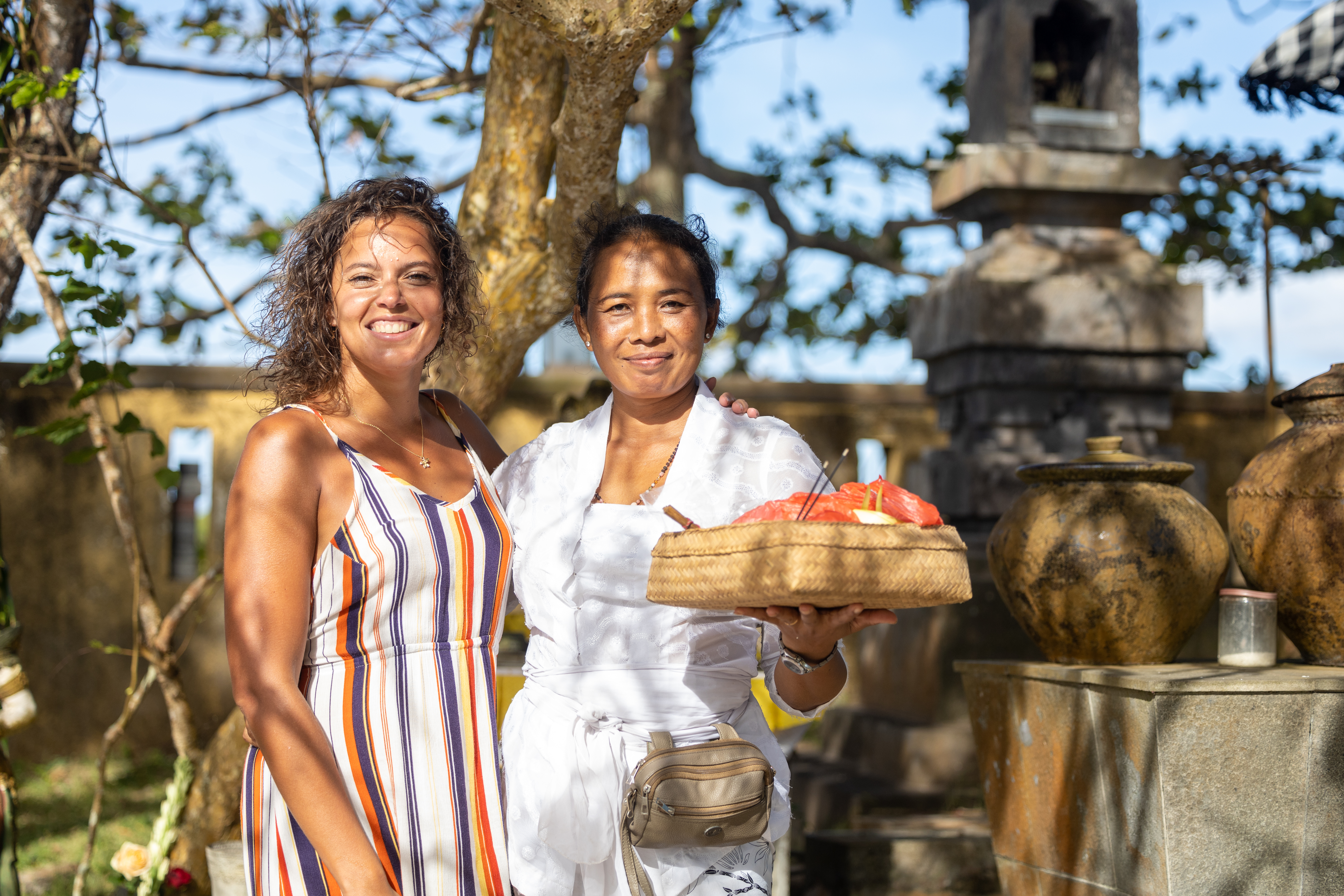 2 women standing in dresses in bali