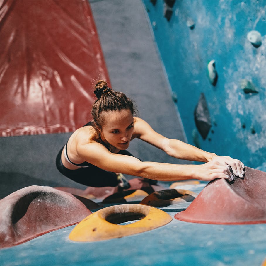 Woman rock climbing