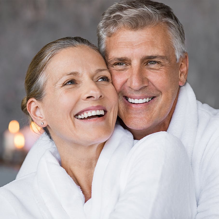 Man hugging woman happily after BHRT in Doc Phillips