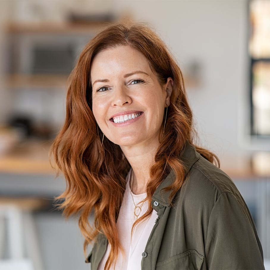 smiling woman after microneedling in Tampa, FL