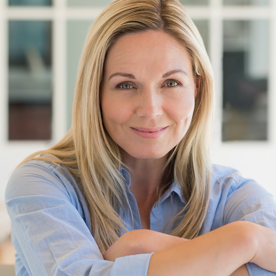 Woman smiling after BOTOX in Doc Phillips