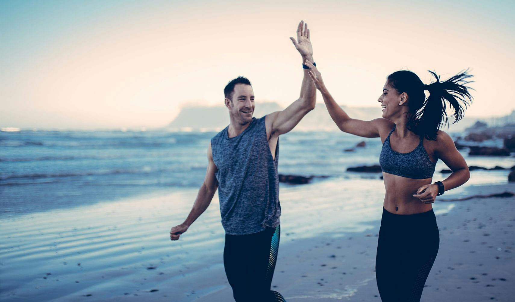 Man and woman high fiving
