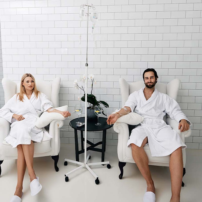 Couple receiving IV therapy at Serotonin Centers.