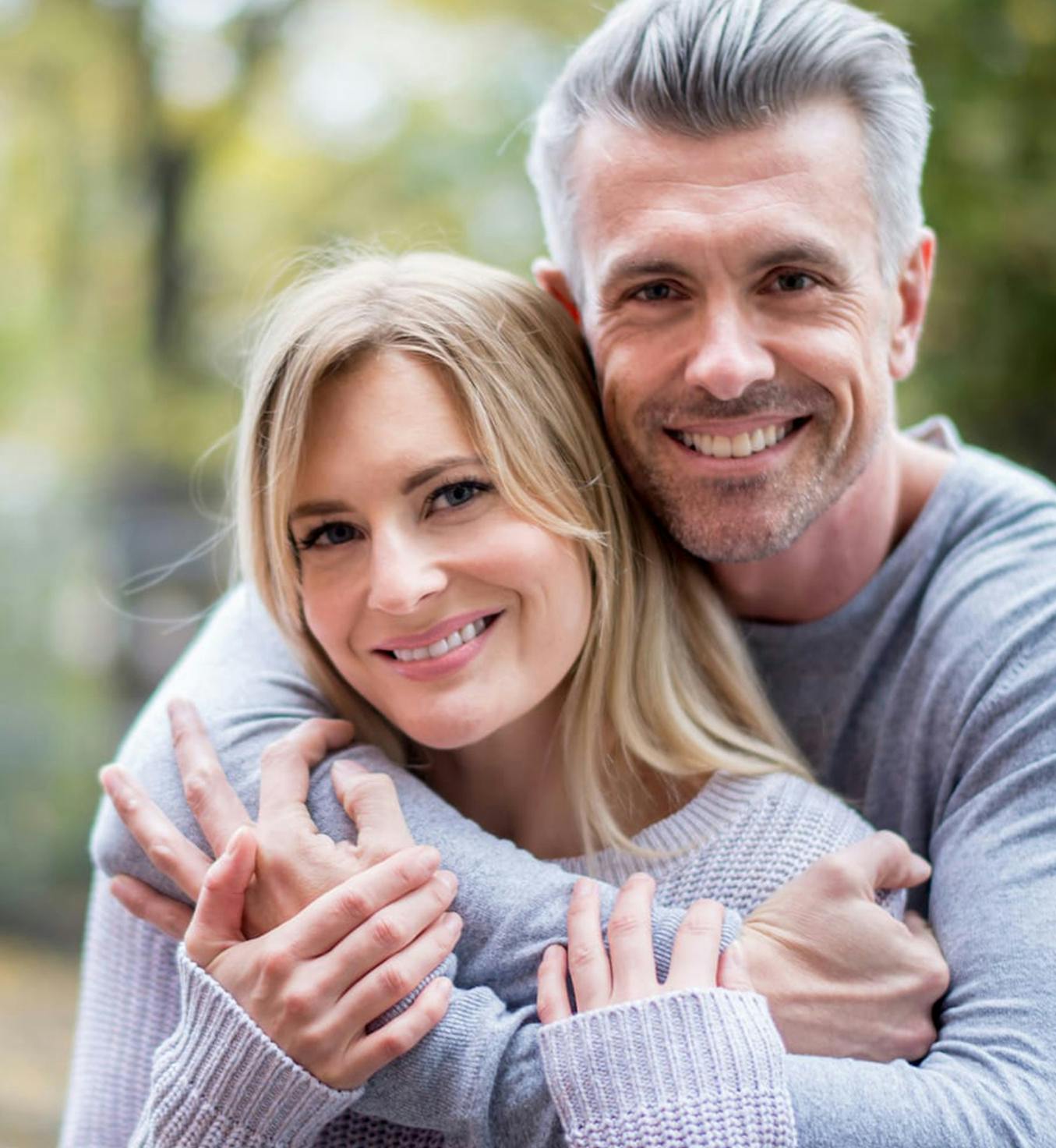 Man and woman holding each other