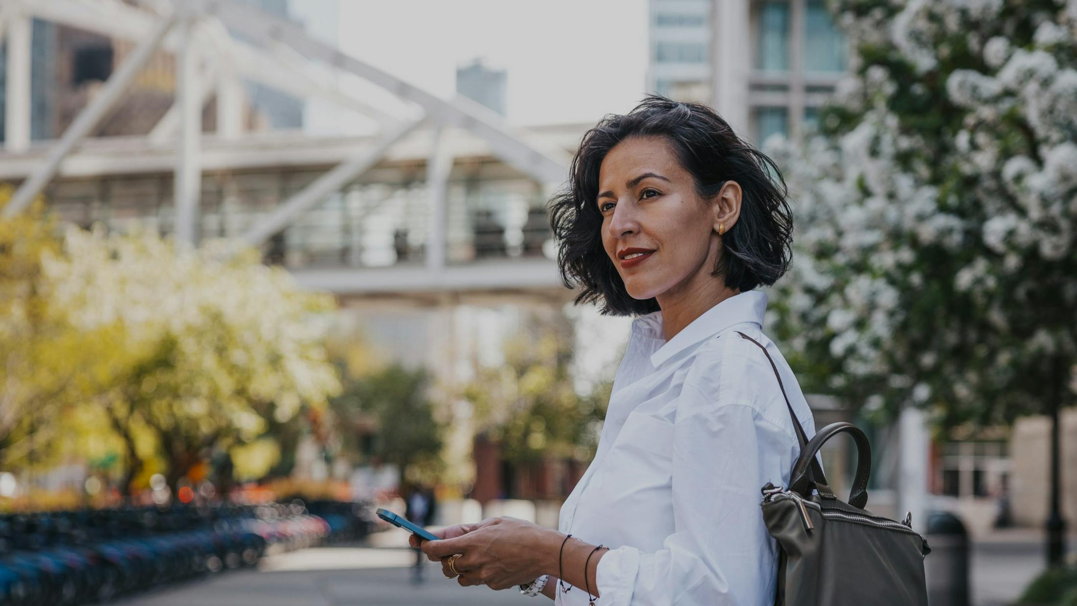 Woman wearing white button up shirt