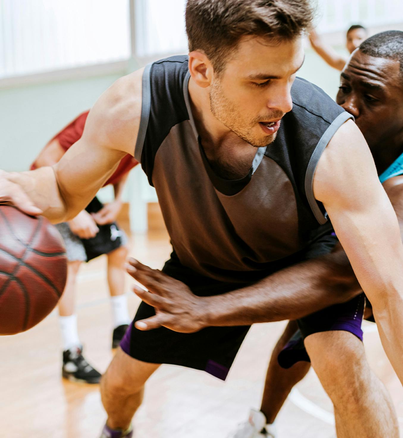 men playing basketball