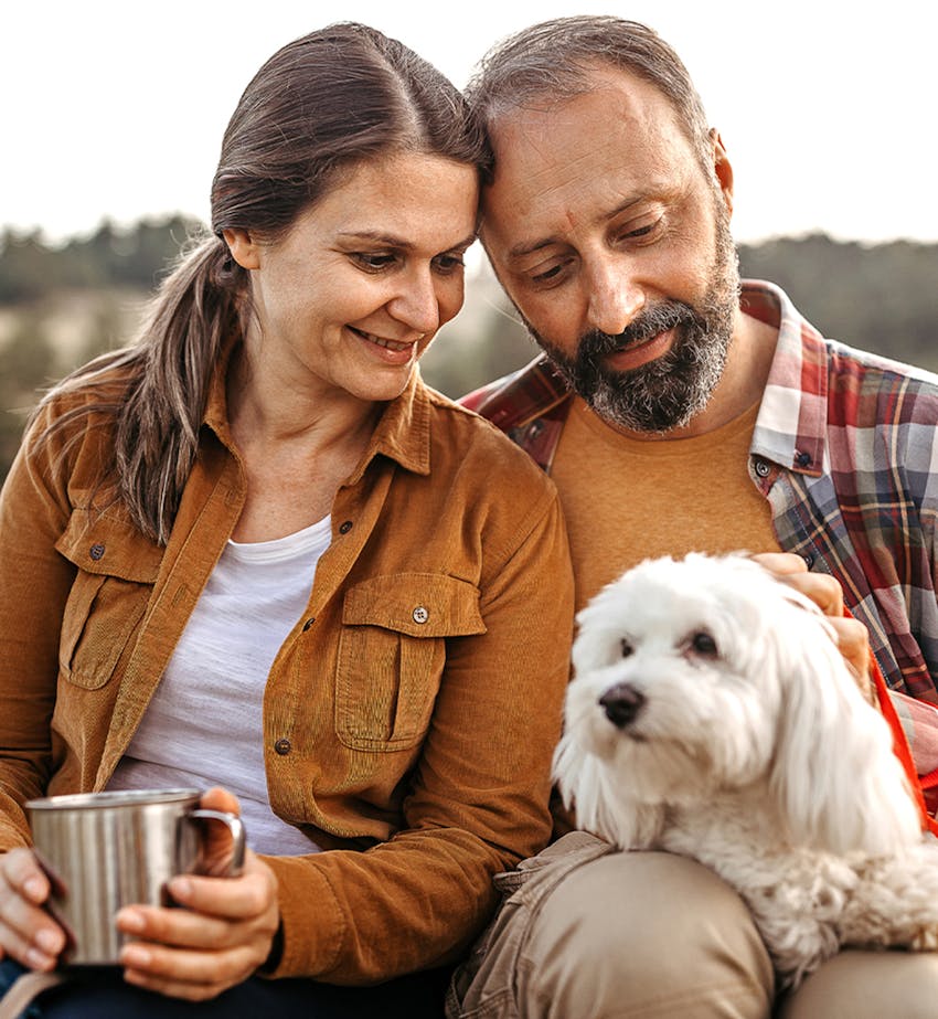 Man and woman with dog