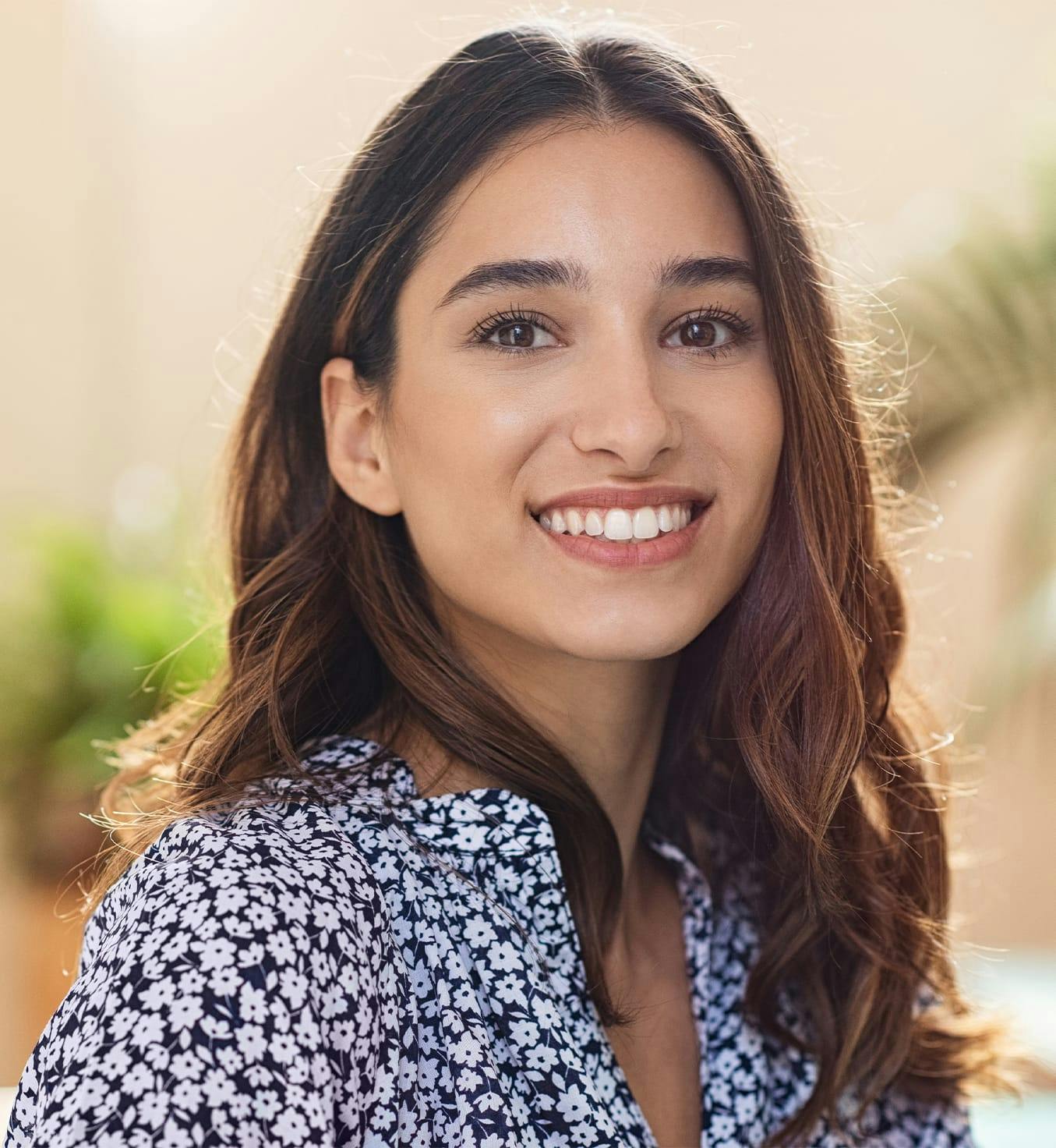 Woman wearing a floral blouse