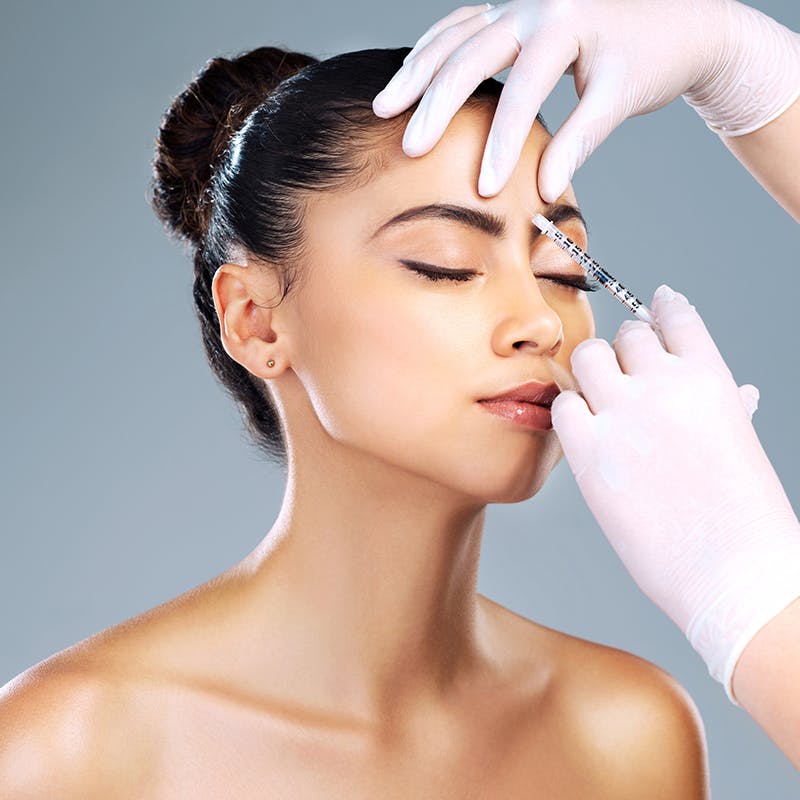 client receiving BOTOX injection in Tampa, FL