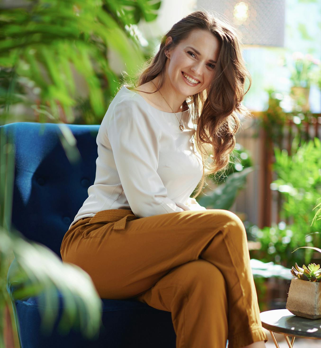 Woman in a orange button up shirt