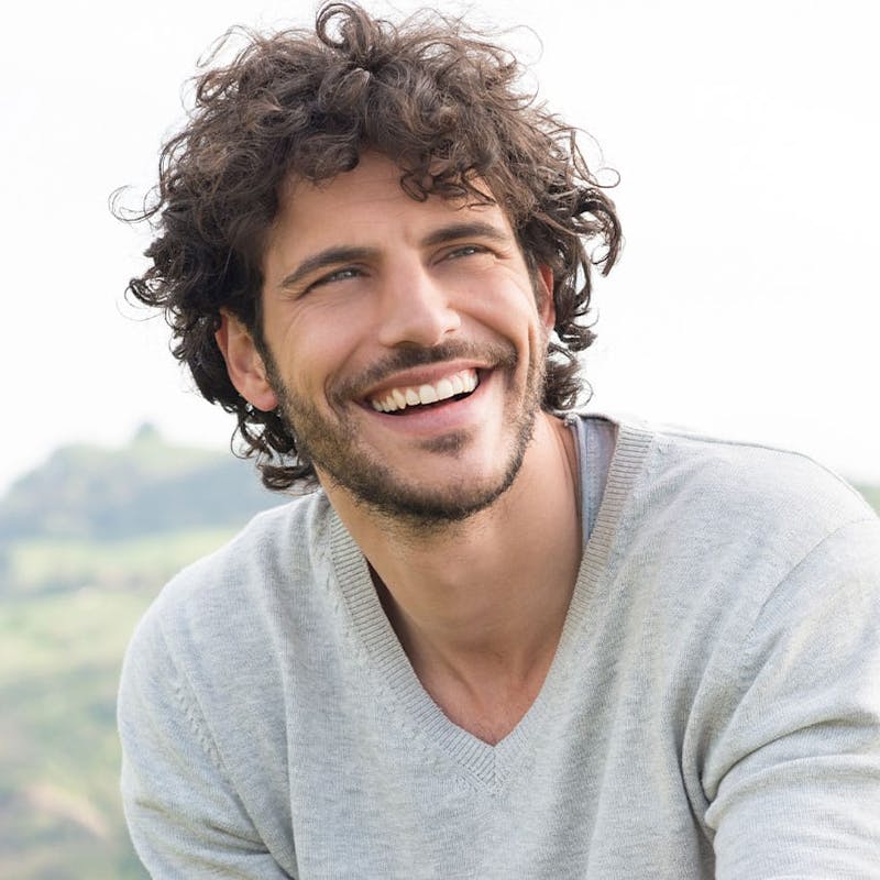 Smiling man after TRT from Serotonin Centers.