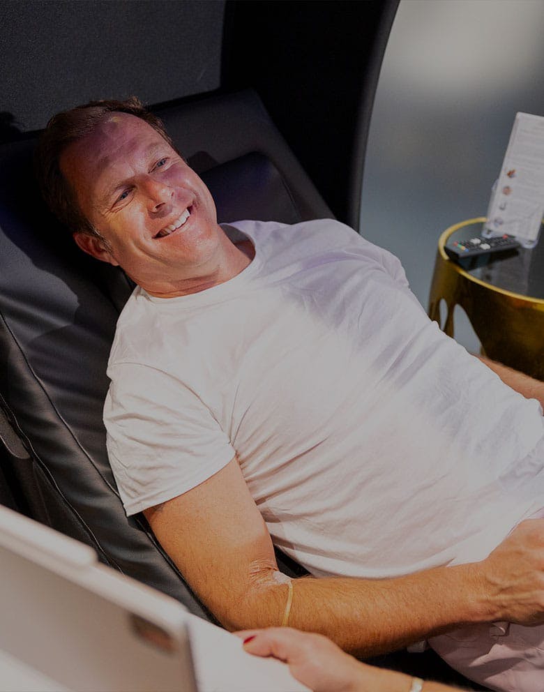 Windermere med spa patient smiling during IV therapy