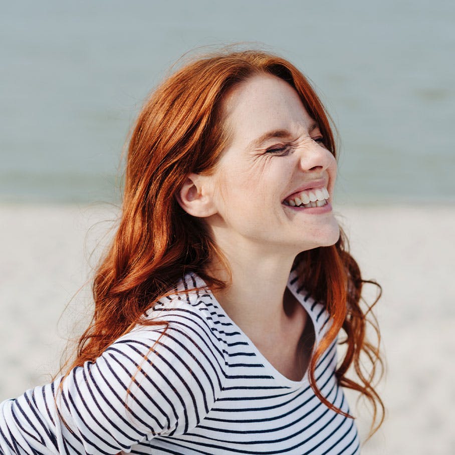 healthy woman after NAD+ therapy in Tampa, FL