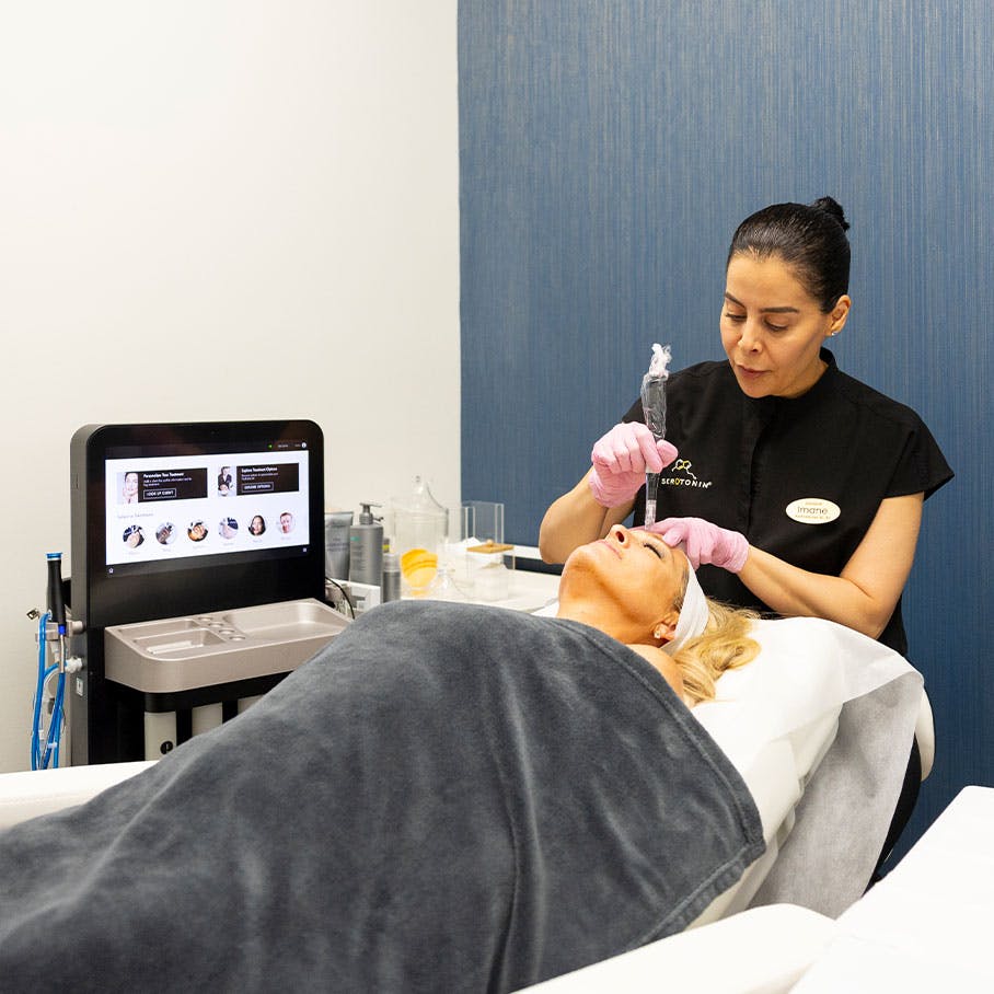 patient receiving microneedling treatment in Del Mar, CA