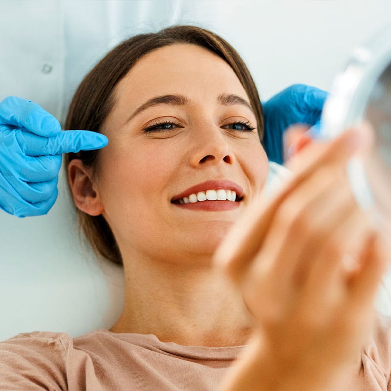 Woman happy with her Botox results at Serotonin Centers.