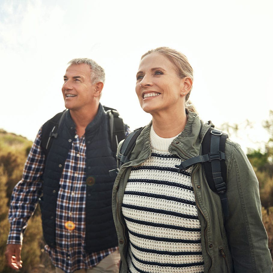 Healthy couple hiking after ExoMind treatment in Stamford, CT