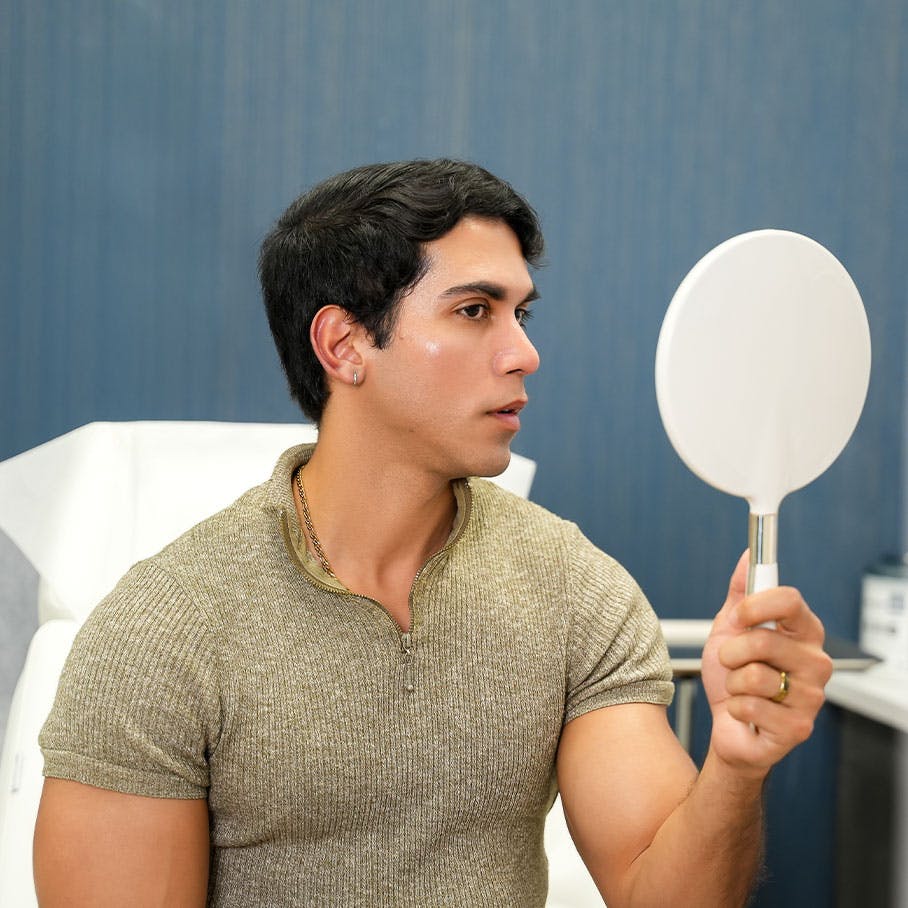 patient examining results of Botox treatment in Colts Neck