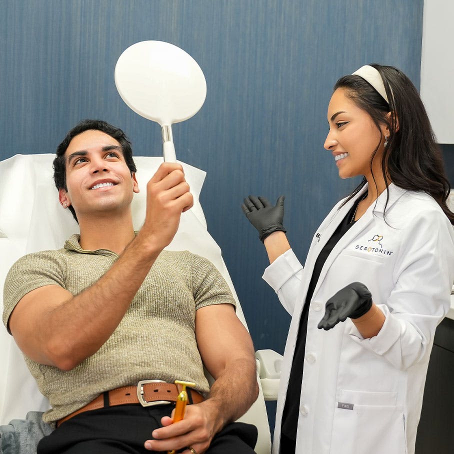 Serotonin team member showing patient results of Sculptra in Orlando
