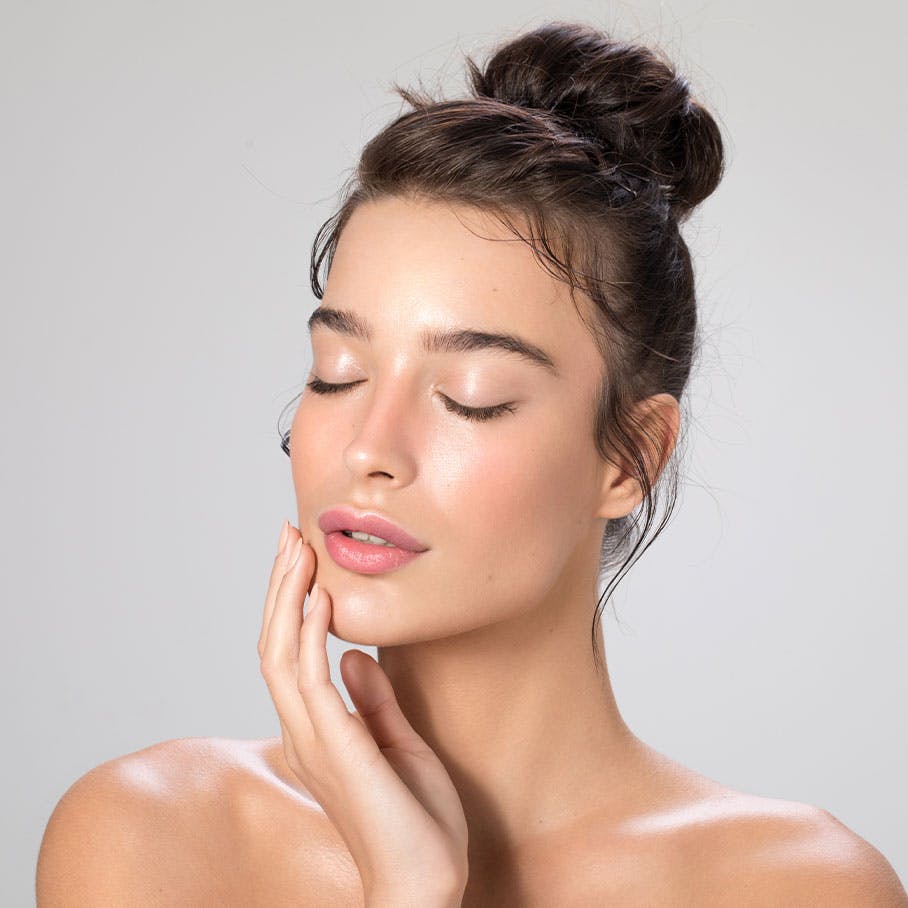 woman with plump lips after lip fillers in Winter Park, FL