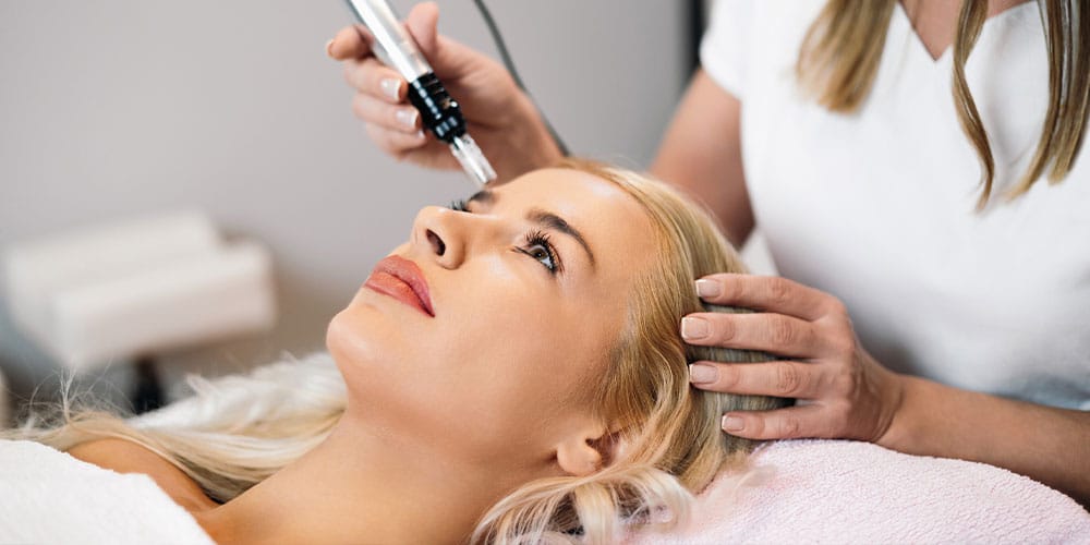 woman getting microneedling with PRP