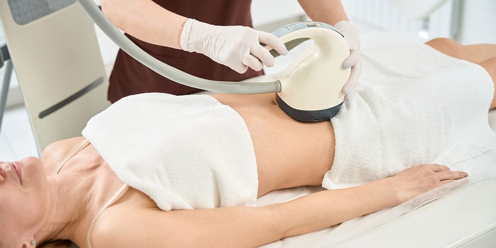 woman getting coolsculpting treatment