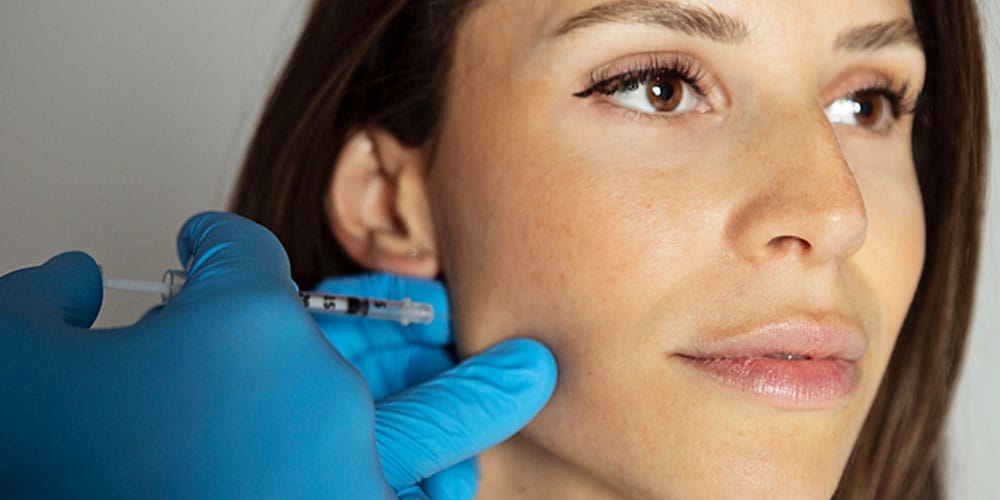 woman getting botox at her first appointment