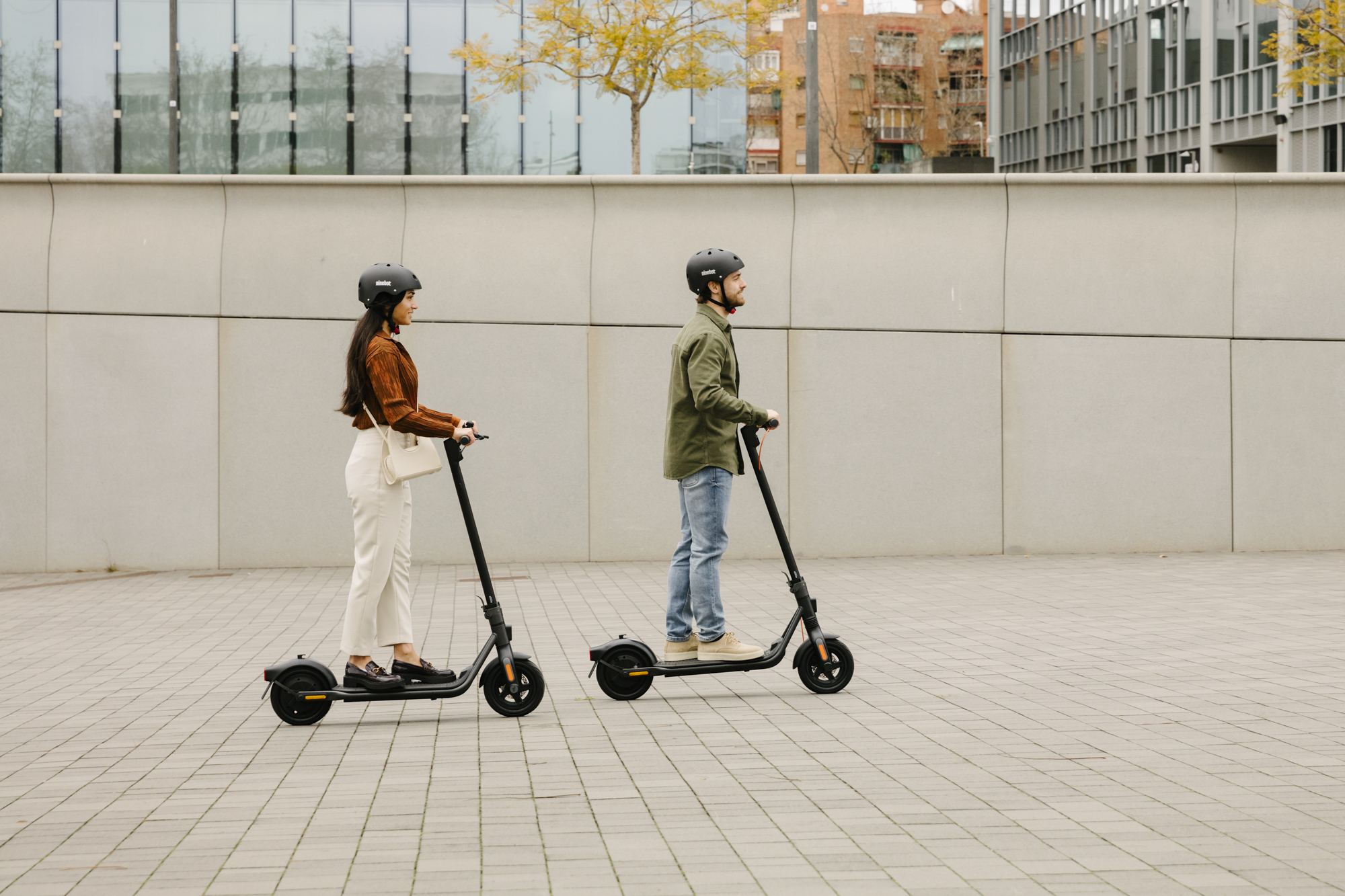two people on scooters