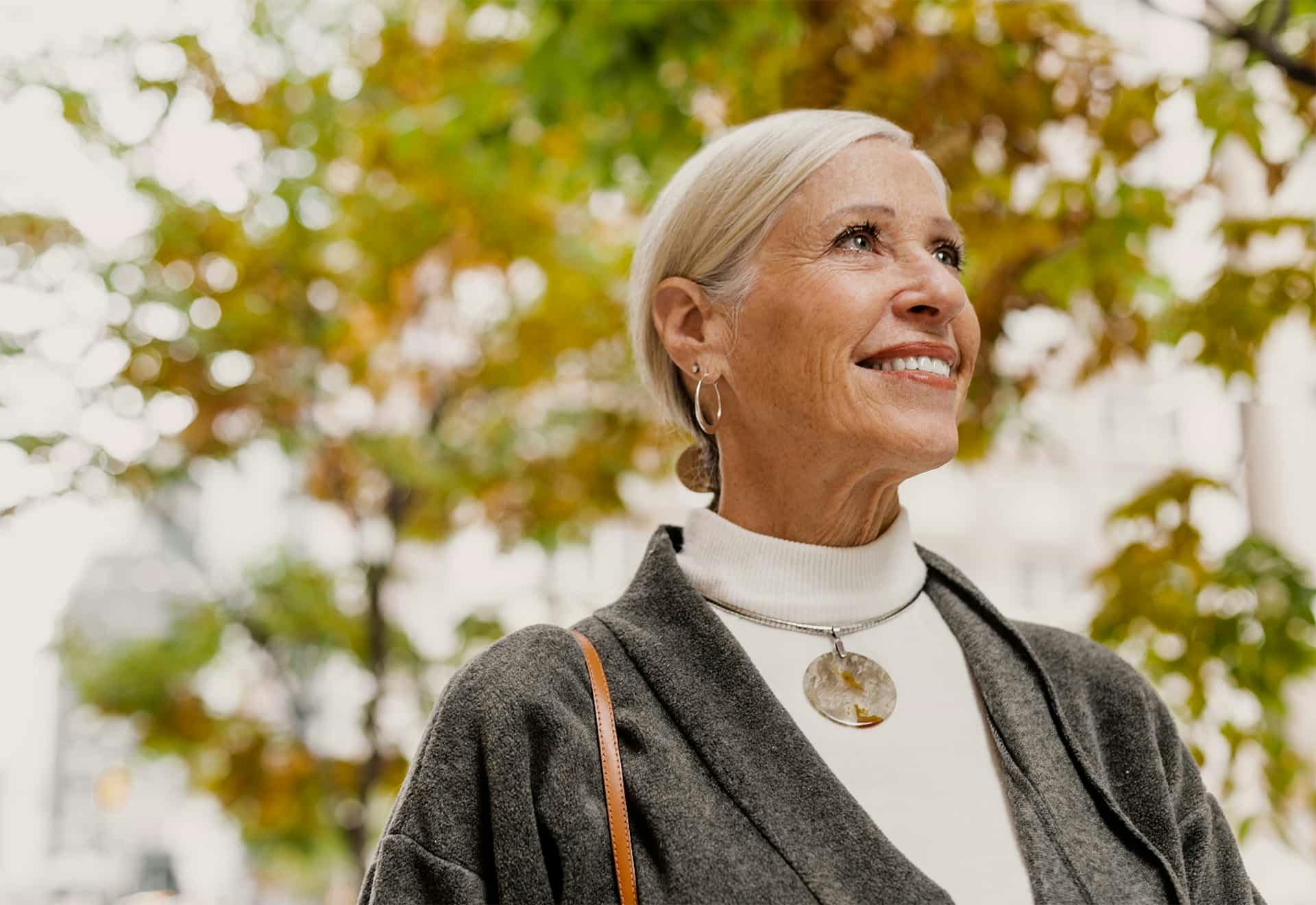 Woman outside smiling