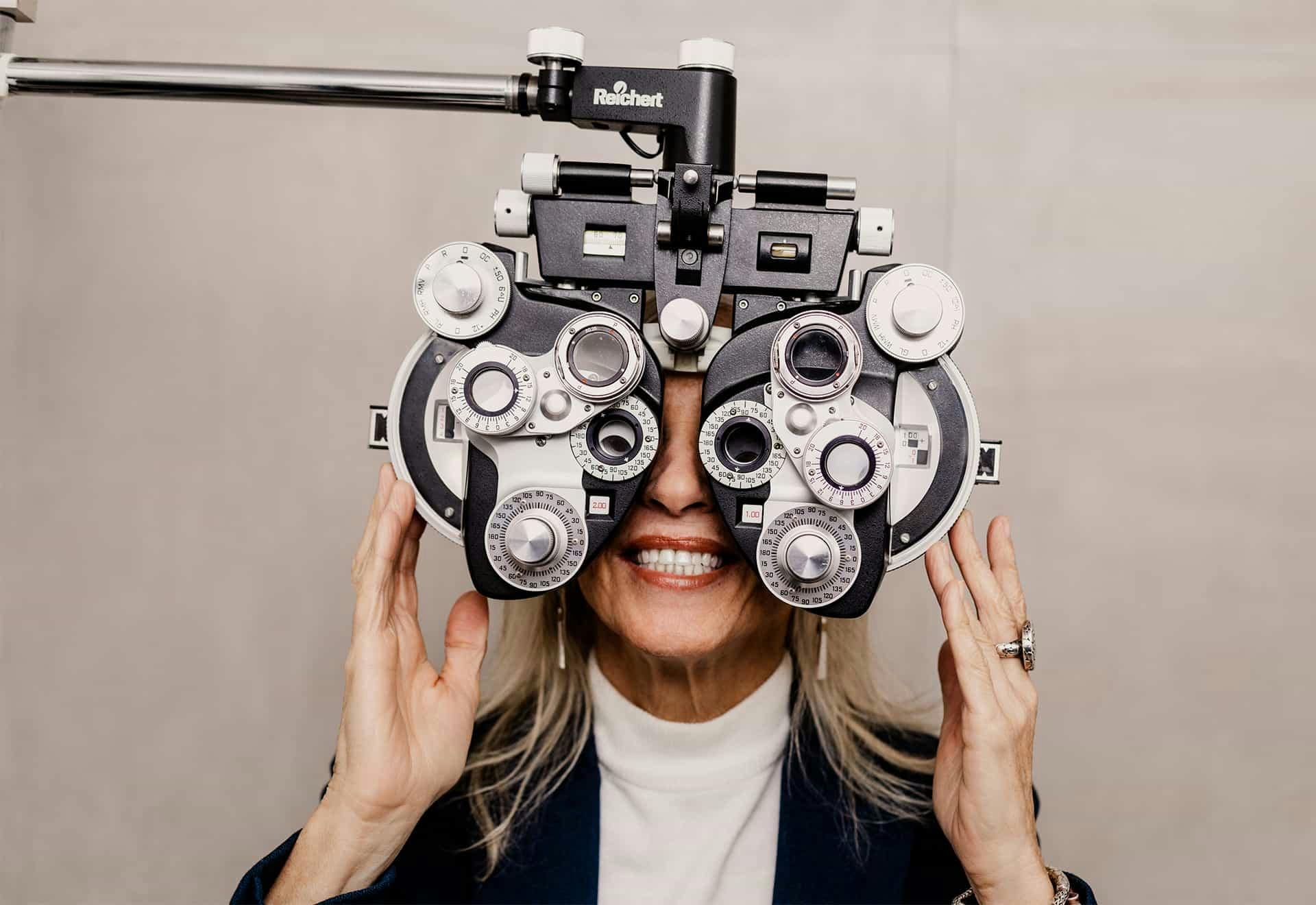 Woman at eye exam equipment