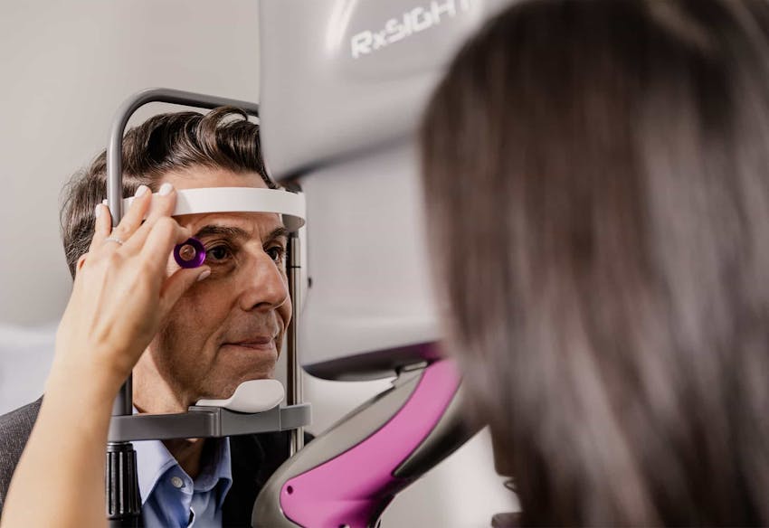 doctor examining patients eyes