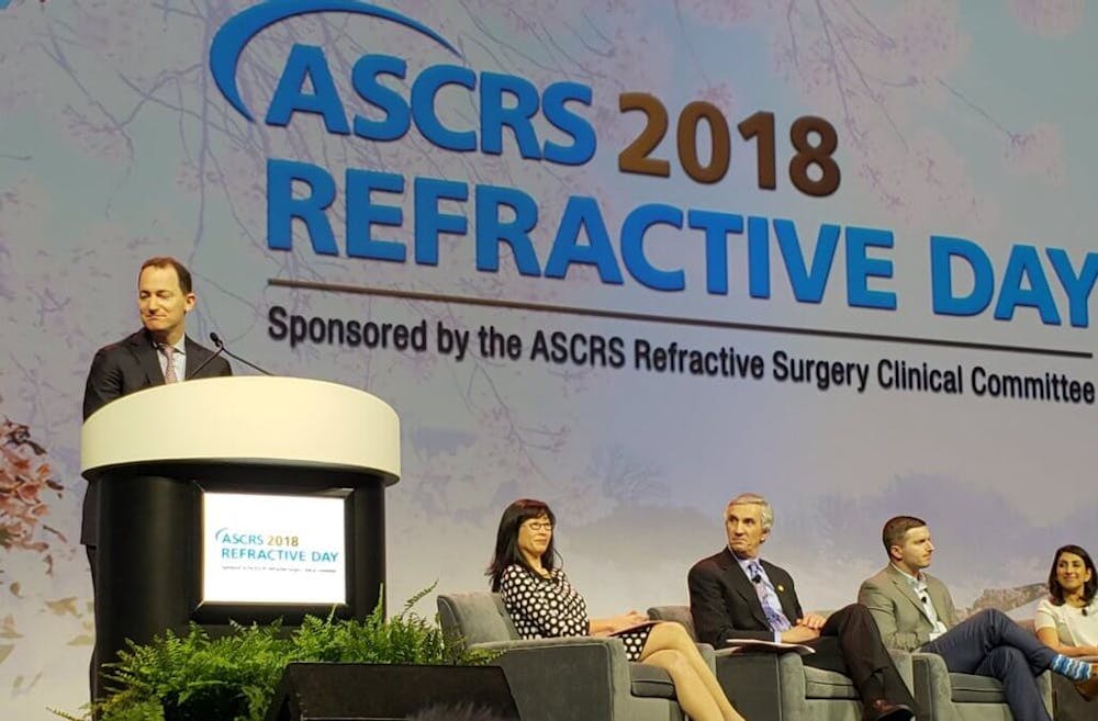 image of dr raviv at a podium at the 2018 ASCRS event