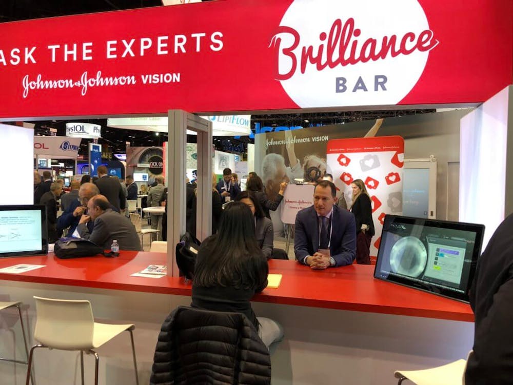 dr raviv at an info booth