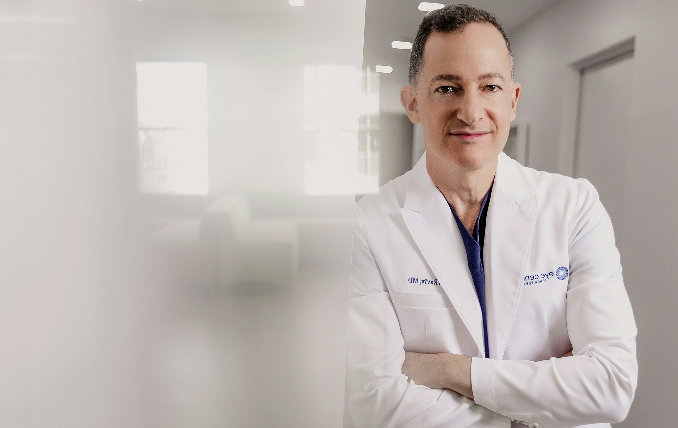 Dr Raviv in a labcoat