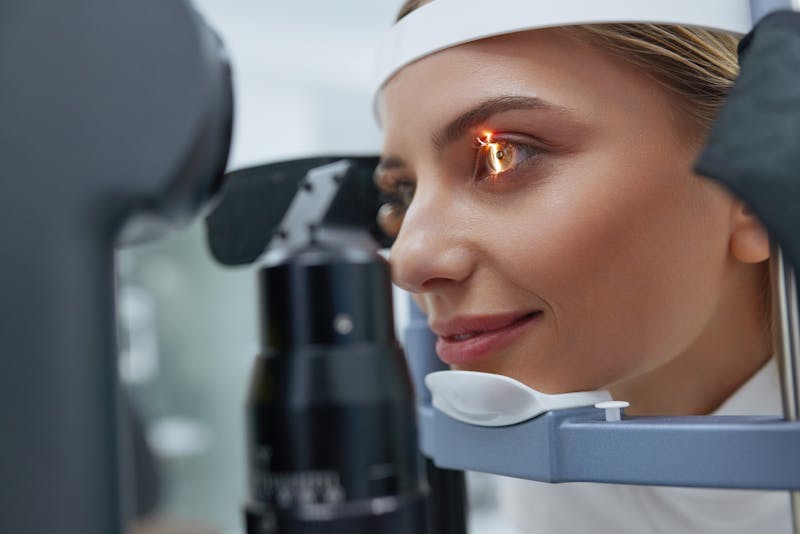 Close-up of woman getting eye test