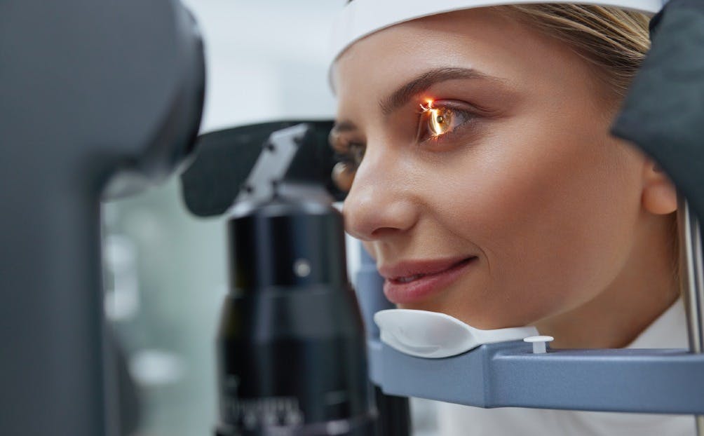 Close-up of woman getting eye test