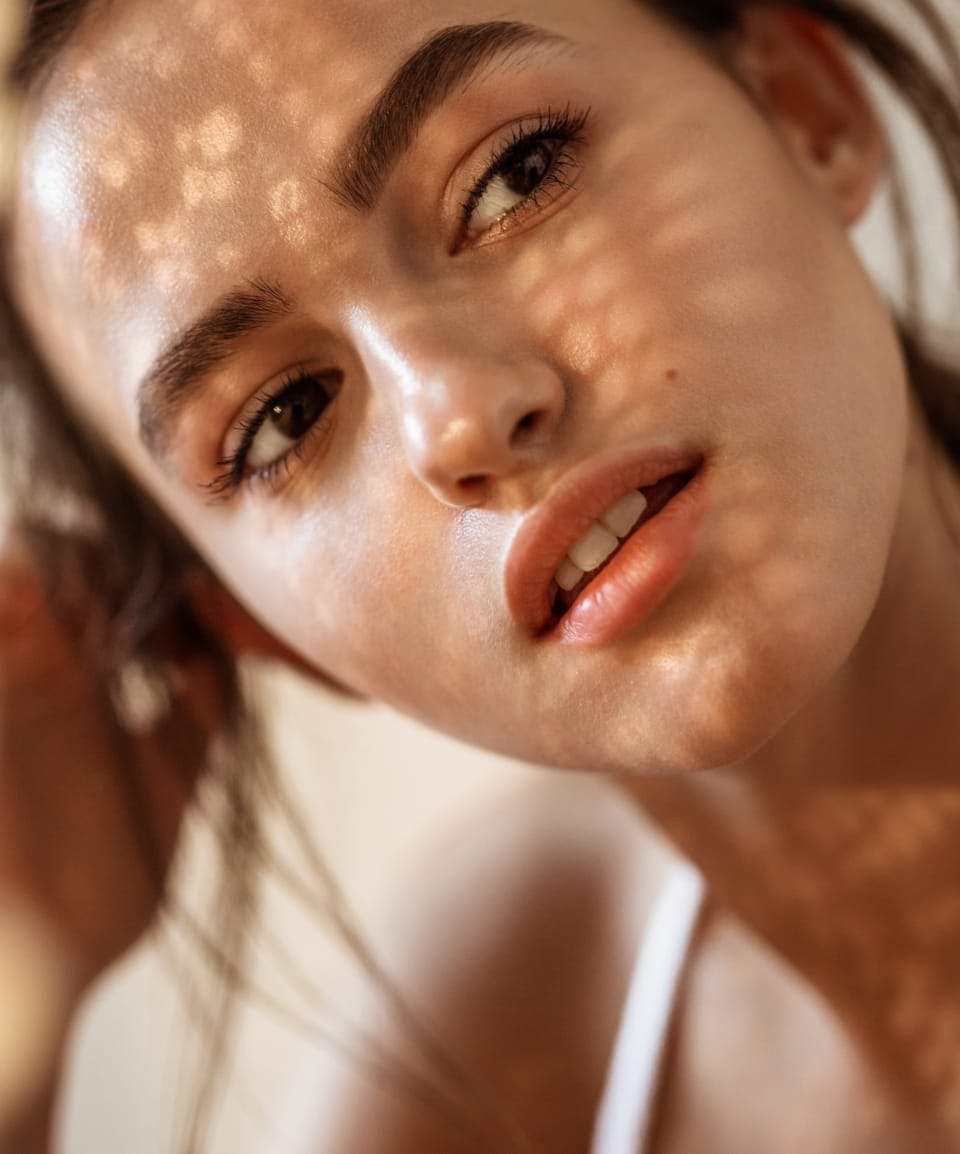 pretty woman with shadows on her face