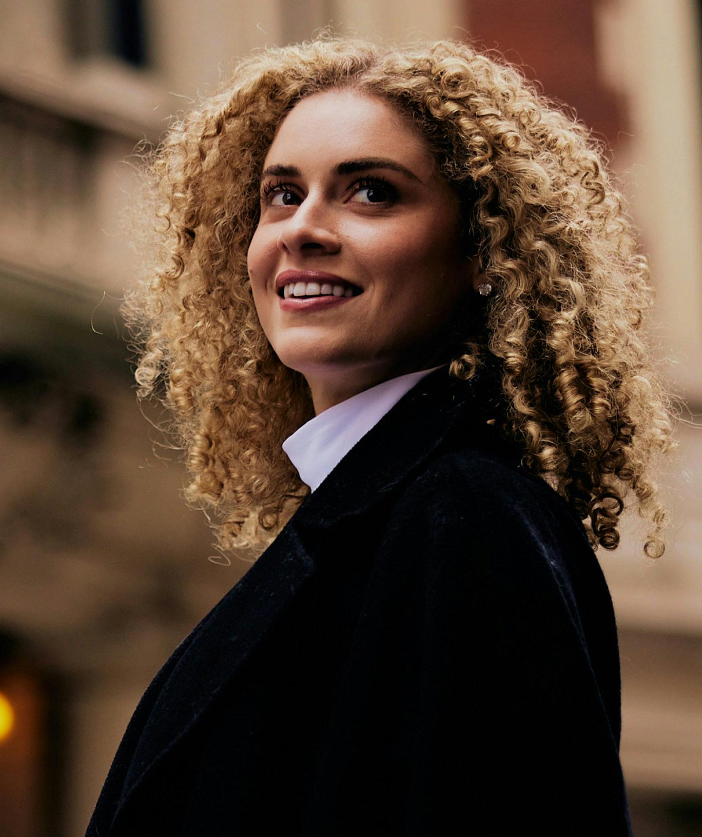 woman with very curly hair