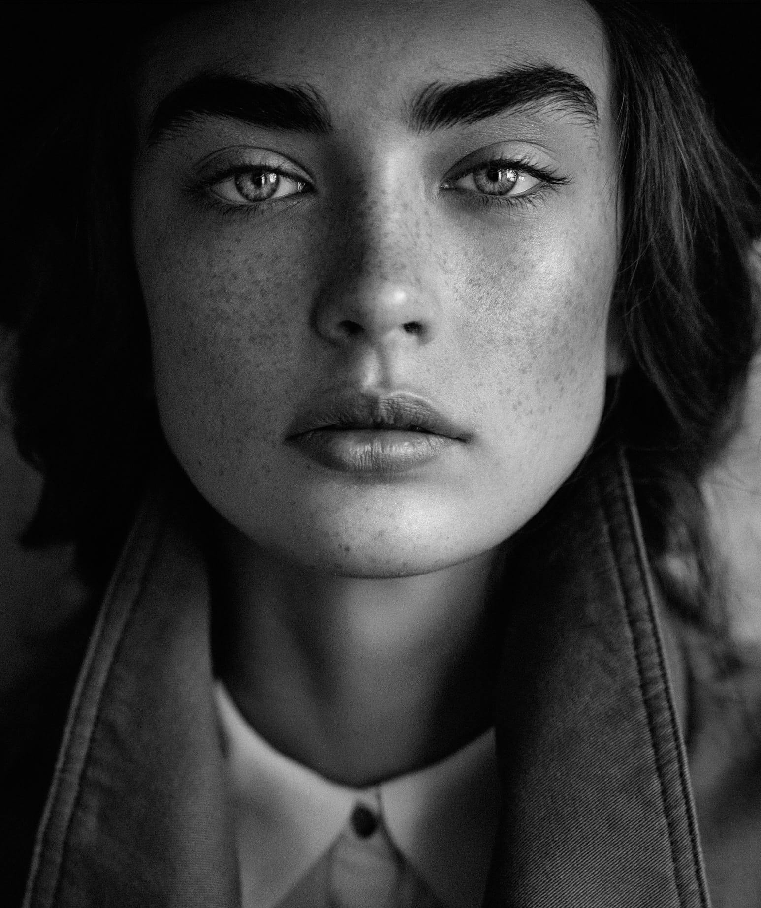 close up black and white photo of a woman
