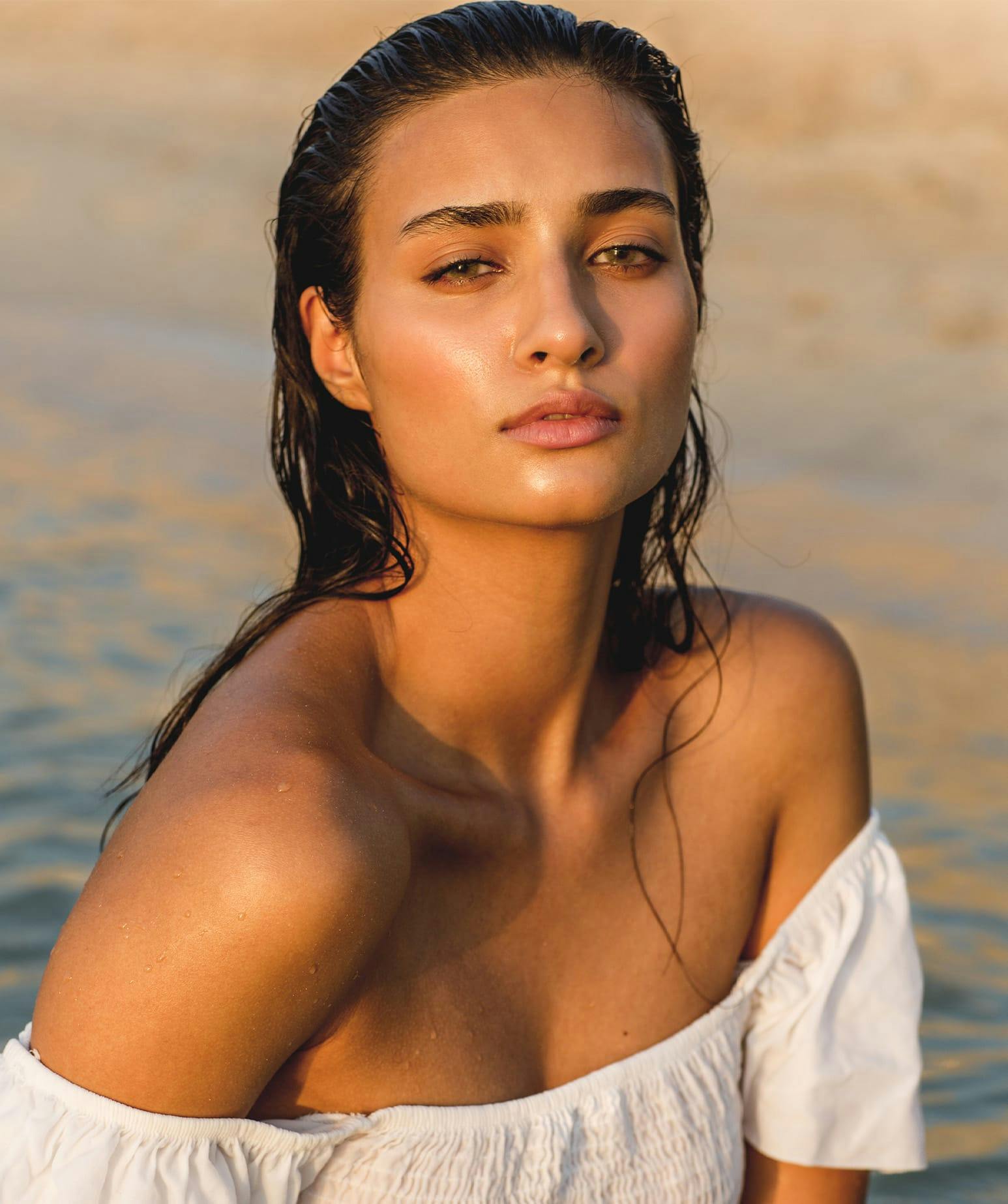 woman sitting on a beach