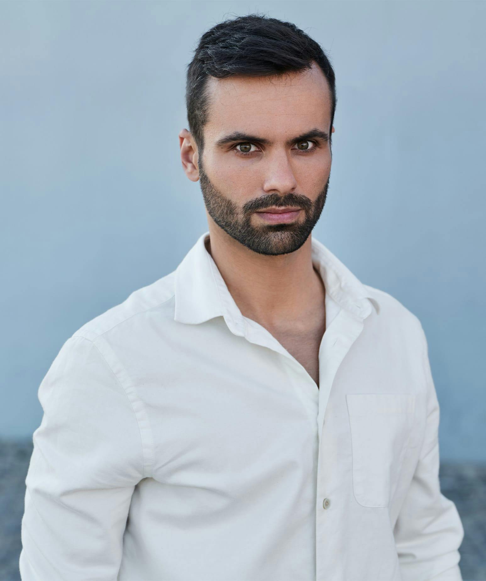 man in white button down