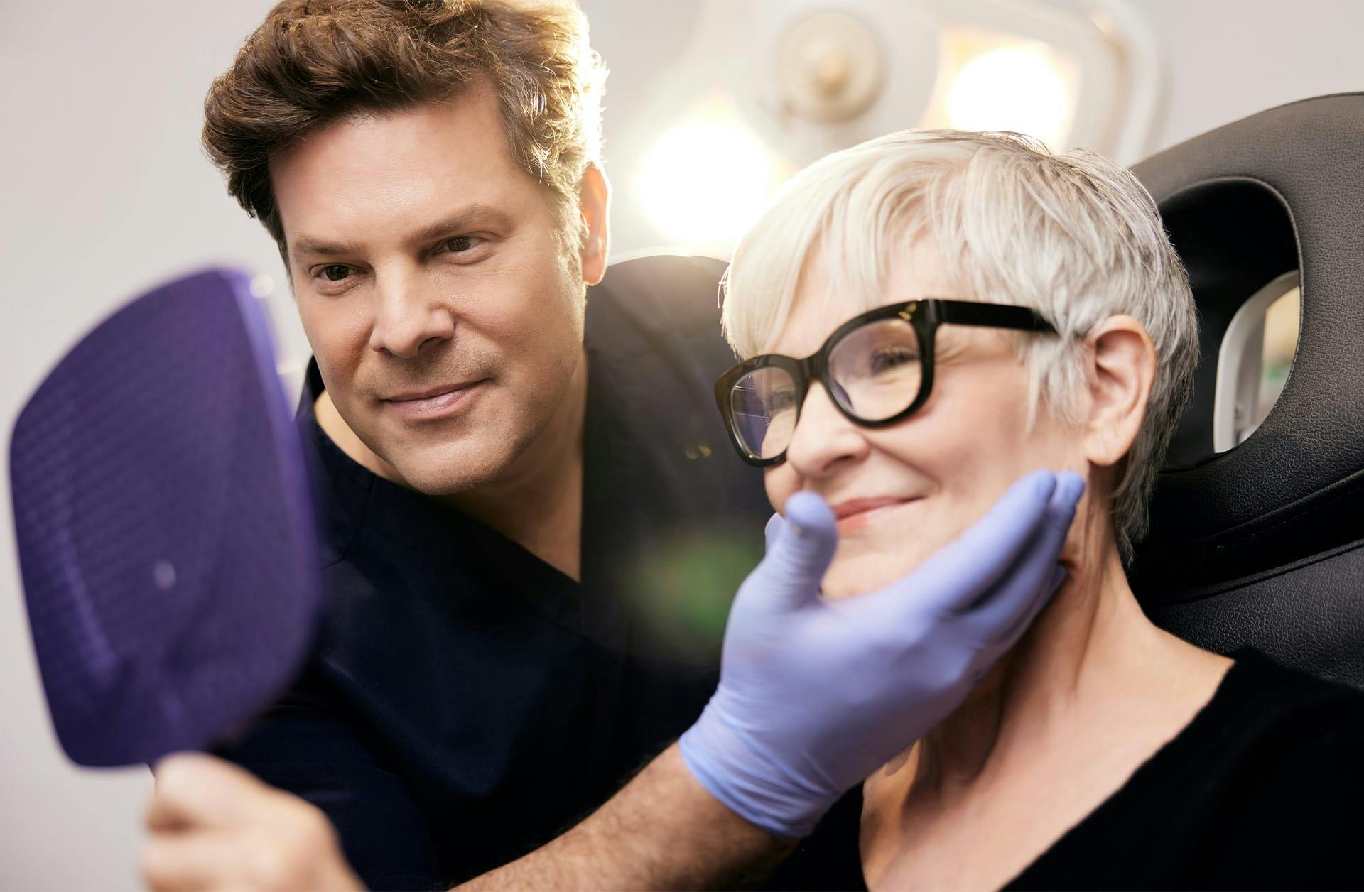Dr. Westreich showing a patient her results