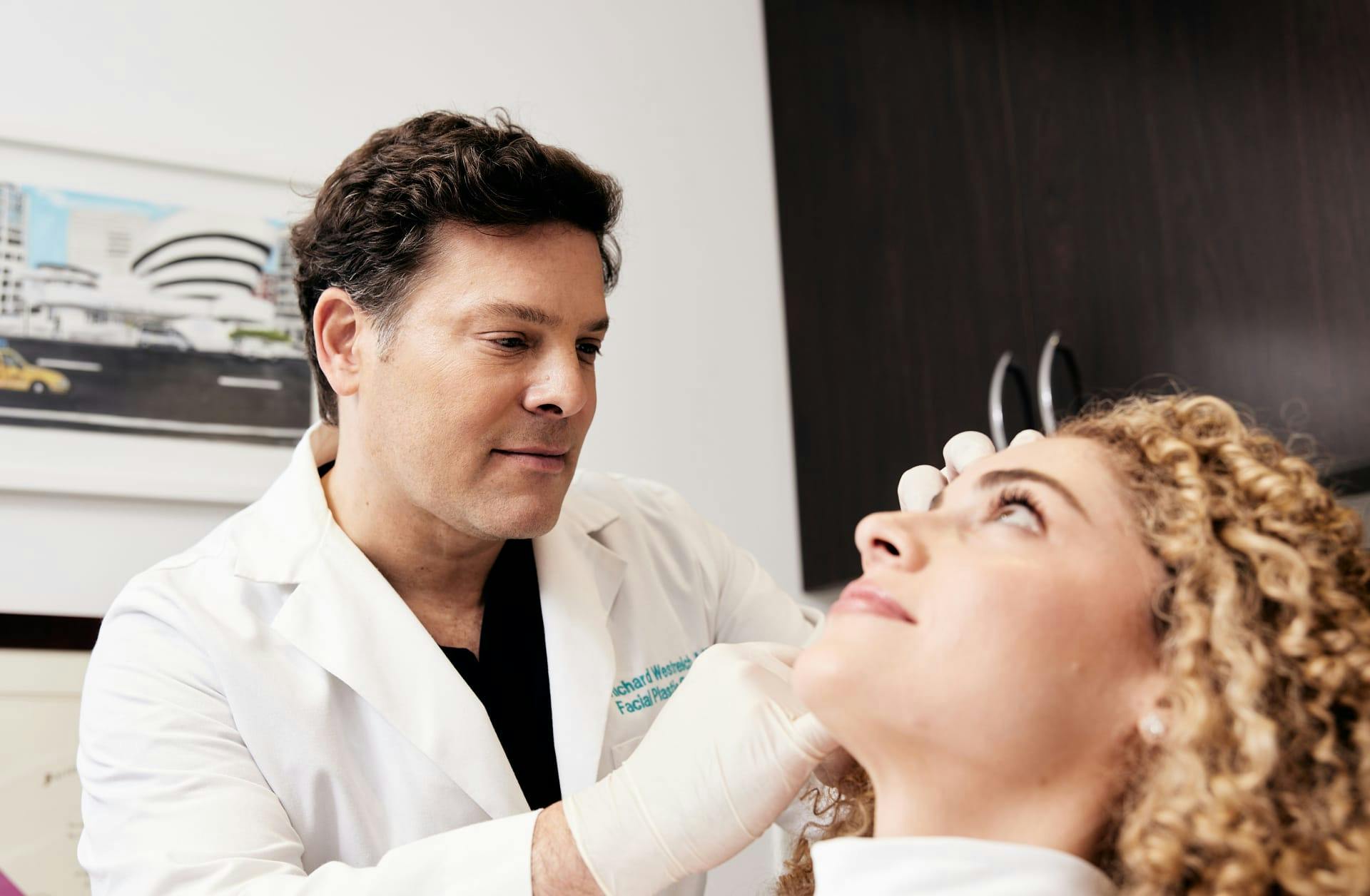 Dr. Westreich with a female patient