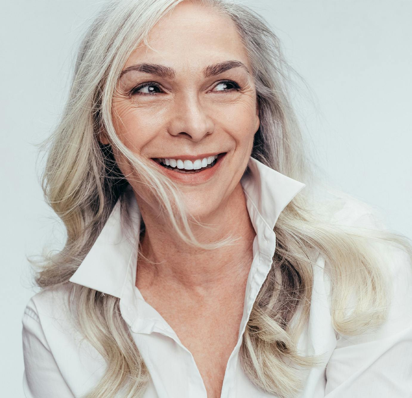 older lady smiling looking to side