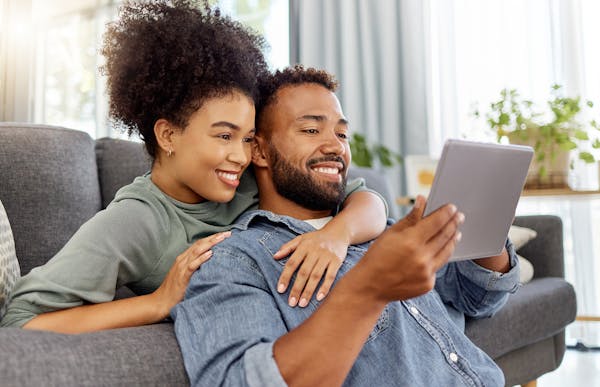 couple looking at ipad together