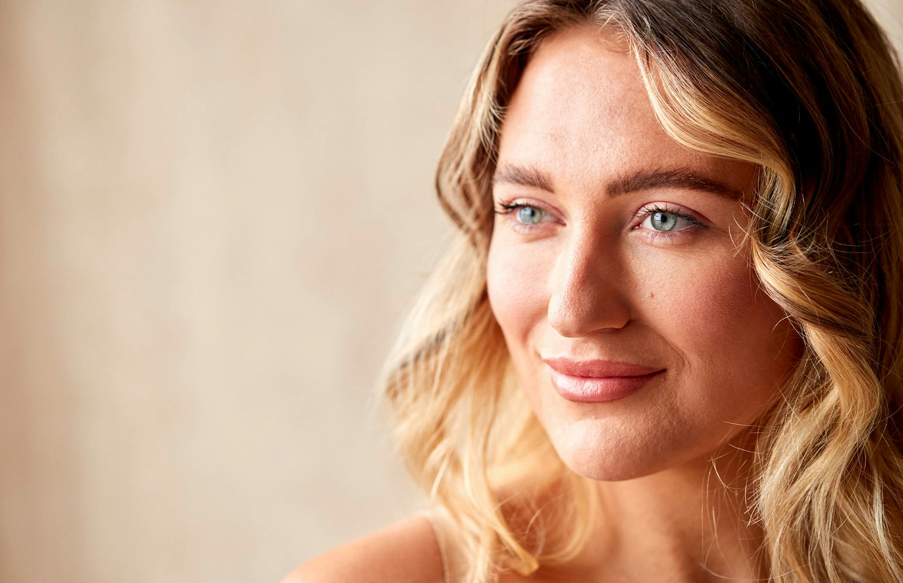 close up of a woman with bright blue eyes