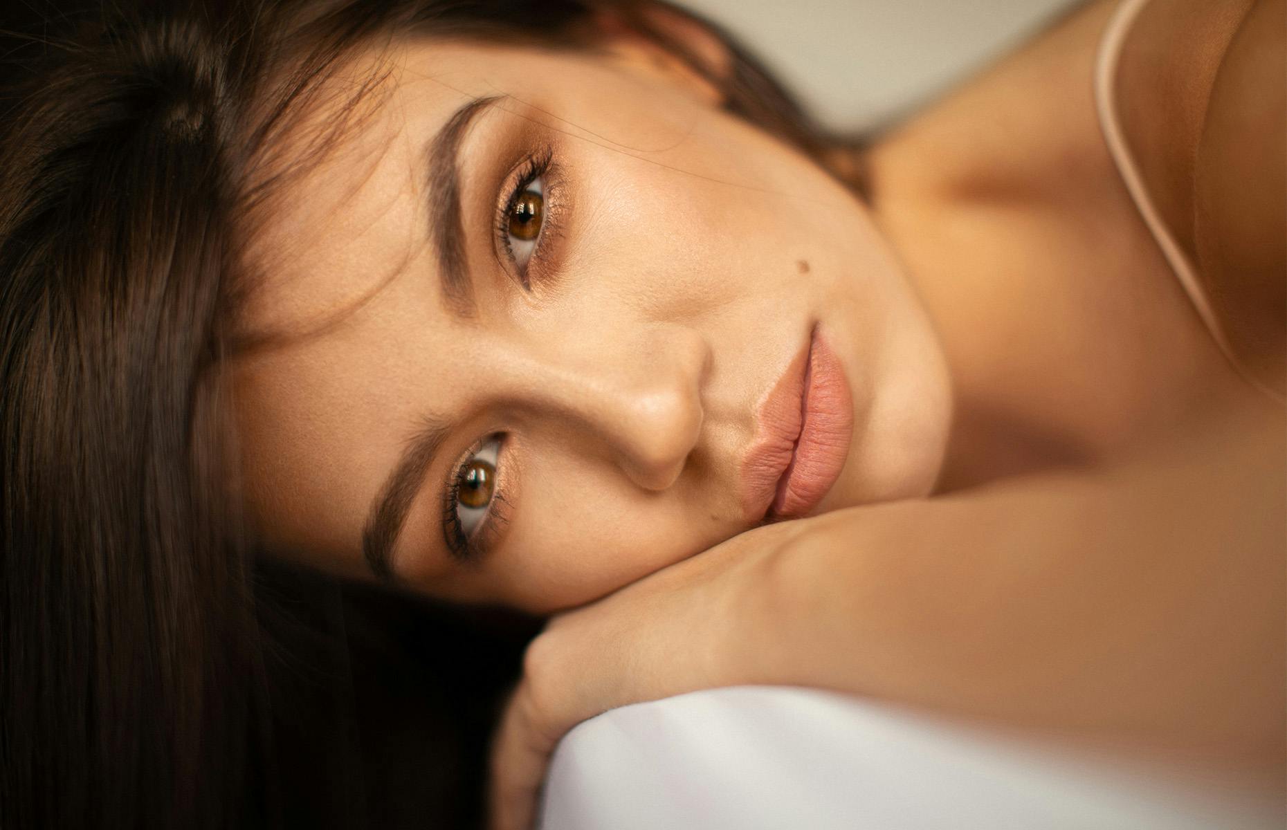 woman laying down close up