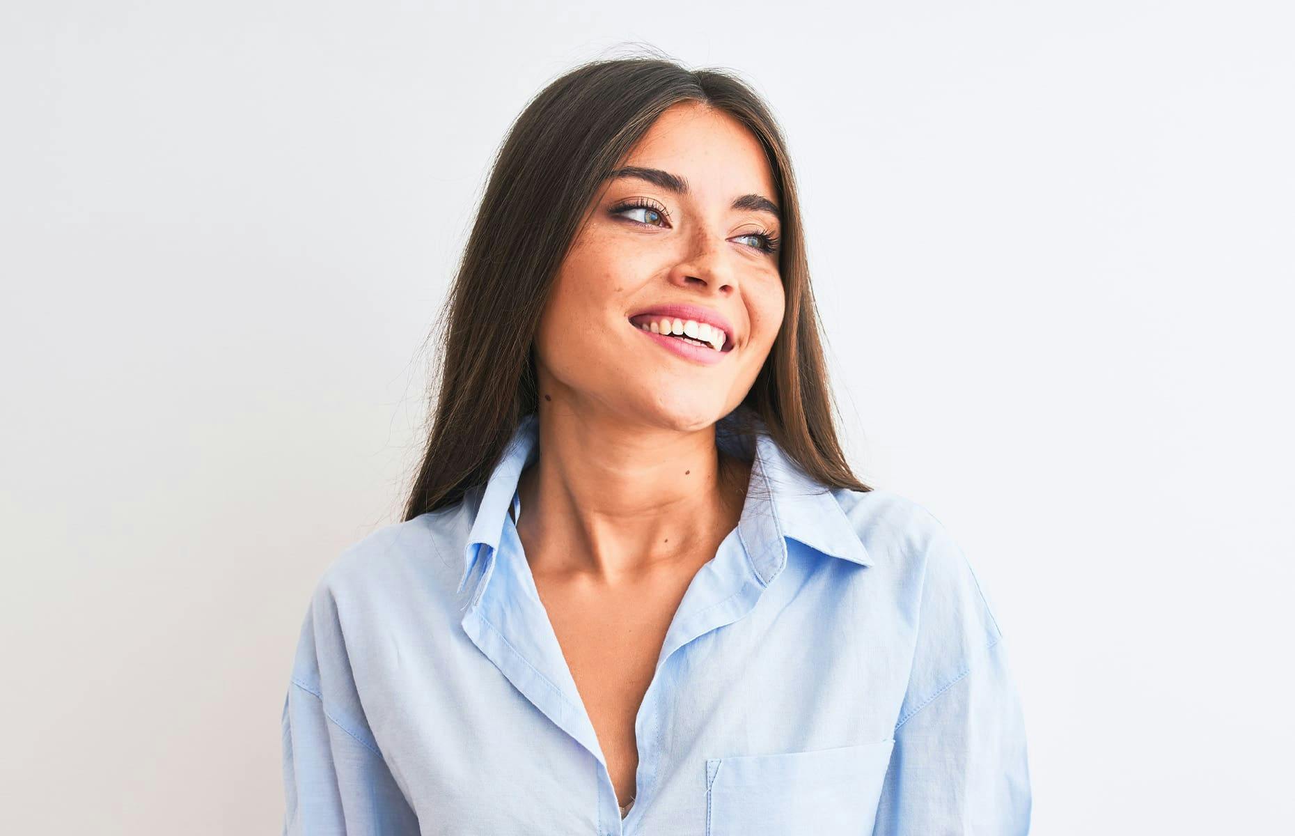 woman smilling on bridge